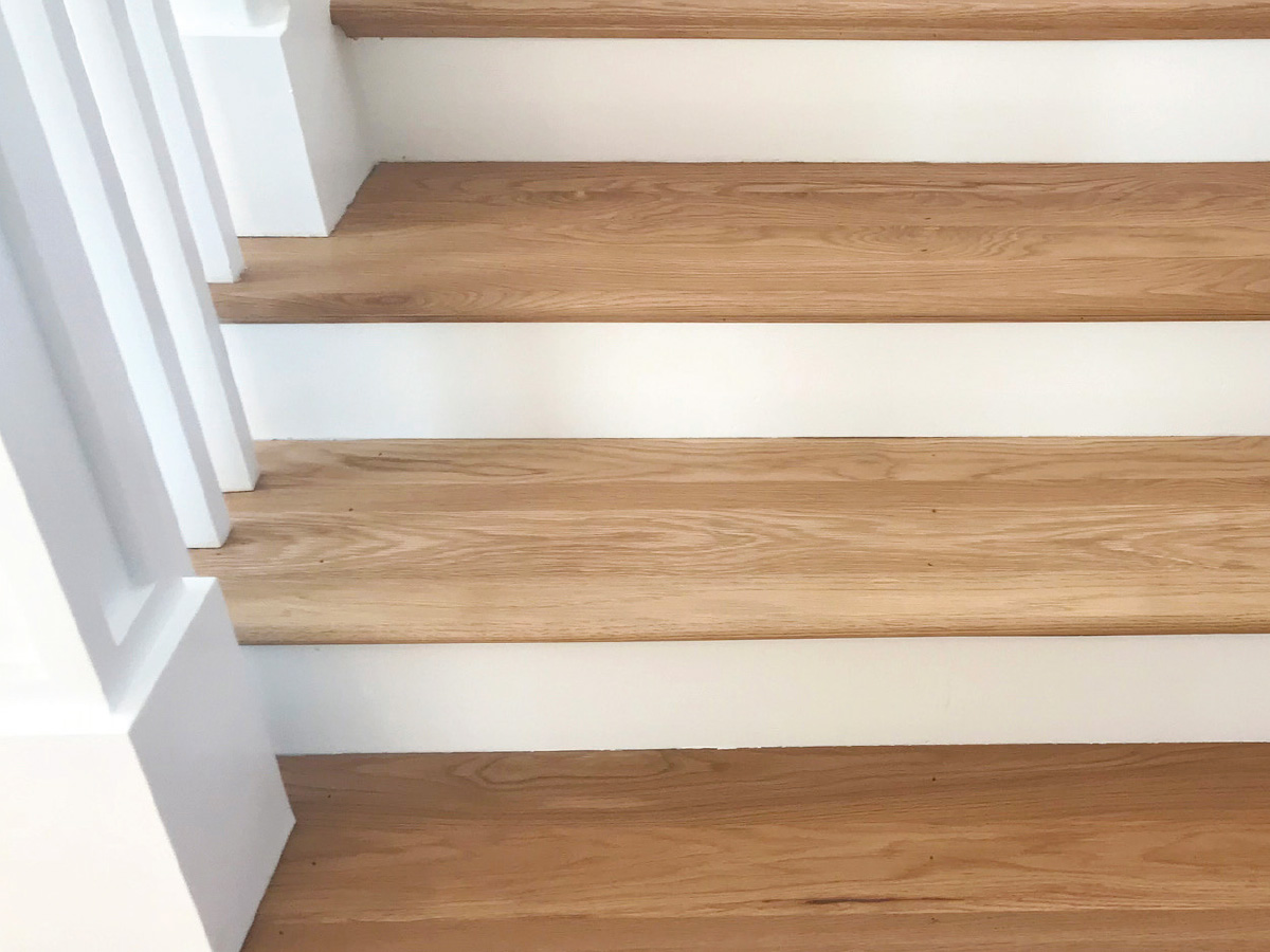 Hardwood stair tread replacement and refinishing